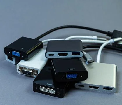 Various converter cables adapters for computers and smartphones Stock Photos
