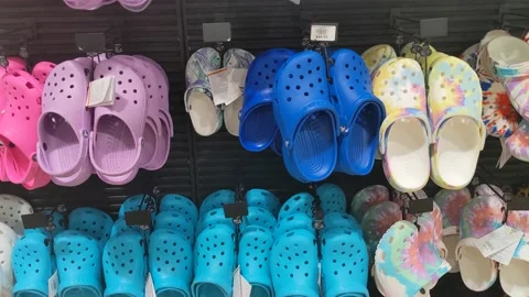 Various Crocs Available for Purchase Stock Footage 152077496