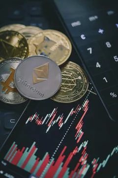 Various Cryptocurrencies with candle stick graph chart and digital background Stock Photos