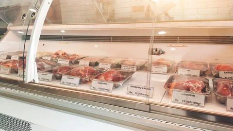 Various cuts of raw beef on display Stock Photos