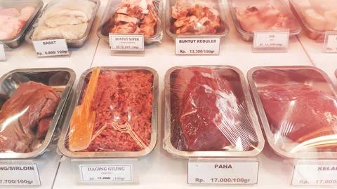 Various cuts of raw beef on display Stock Photos