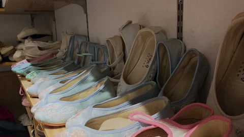 Various dancing shoes on the props rack in the photography studio Stock-Footage 300206280