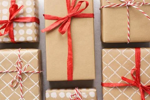 Various decorated gift boxes on light gray background. Stock Photos