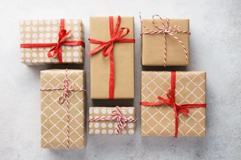Various decorated gift boxes on light gray background. Stock Photos