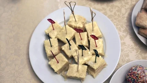 Various delicious desserts at the wedding table: cupcakes, cake napoleon, sugar Video stock 70754787