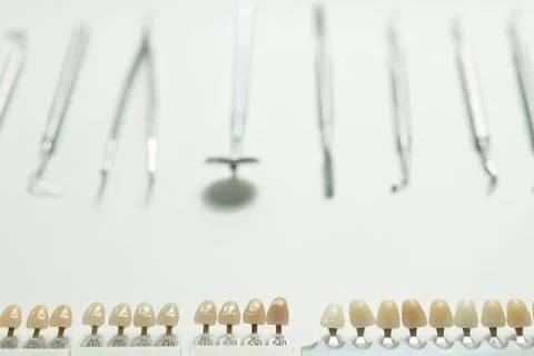 A various dental tools laid out flatlay on a light background Stock Photos