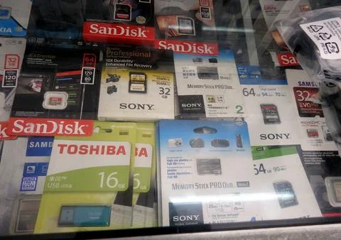 Various Digital Memory Storage in Shop Display Cases Stock Photos