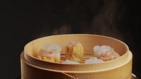 Various of dim sum on wooden steamer close-up macro. Steaming Technique. Chinese Stock Footage 259075103
