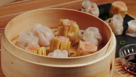 Various of dim sum on wooden steamer close-up macro. Steaming Technique. Chinese Stock Footage 264699799