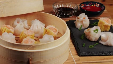 Various of dim sum on wooden steamer close-up macro. Steaming Technique. Chinese Stock Footage 266959477