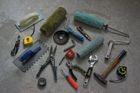 Various dirty  builder tools on grunge background Stock Photos