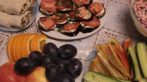 Various dishes and salads on table Stock Footage 147030345