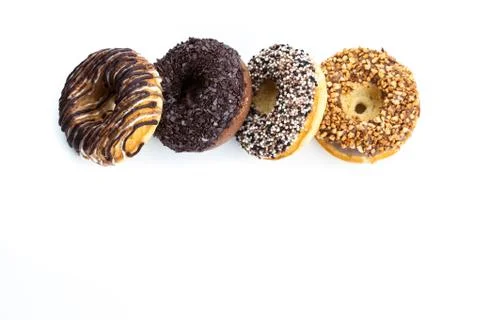 Various donuts on white background Stock Photos