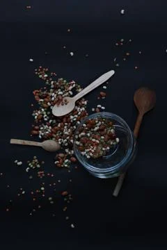 Various dried beans on the black background Stock Photos