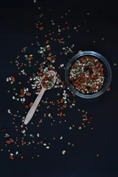 Various dried beans on the black background Stock Photos