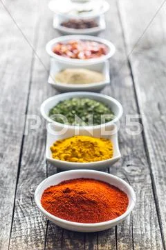 Various dried herbs and spices. Stock Photos