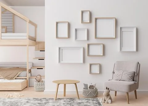 Various empty picture frames on white wall in modern child's room. Mock up 스톡 일러스트