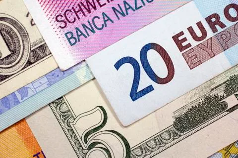 Various Euro, US dollar and Swiss franc banknotes Stock Photos