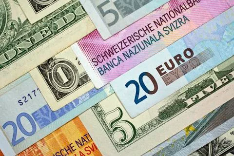 Various Euro, US dollar and Swiss franc banknotes Stock Photos