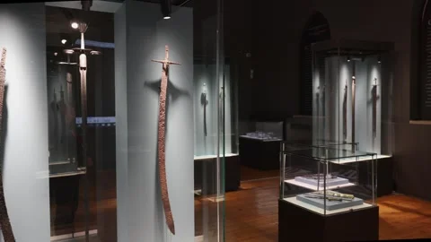 Various examples of bladed weapons in the archaeological museum of Sofia Stock Footage 320447394