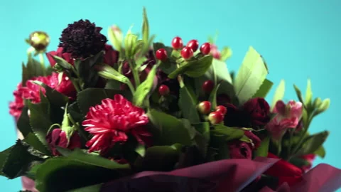 Various flowers in a red basket. Stock Footage 318580089
