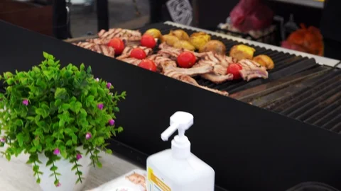 Various food, mostly grilled meat and raw steak at street food market Stock Footage 120016385