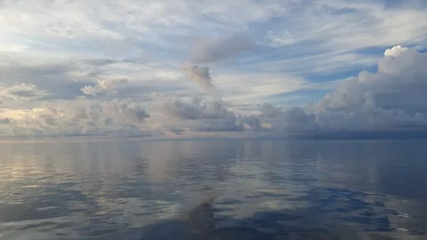 Various forms of cloud formations above the Banda Sea Stock Footage 294051308