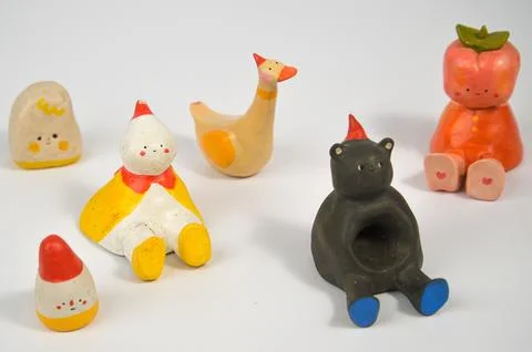 Various forms of handmade clay figures Stock Photos