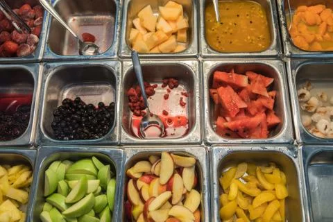 Various fresh fruit and vegetable salad bar healthy items Stock Photos
