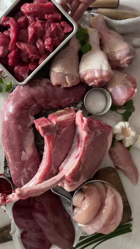Various fresh raw meat. Top view	 Stock Footage 335357977