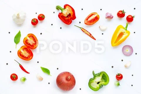 Various fresh vegetables and herbs on white. Healthy eating concept Stock Photos