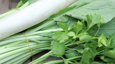 Various fresh vegetables on wood background Stock Footage 227072508