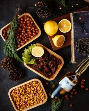 Various fried snacks with sliced lemon Stock Photos