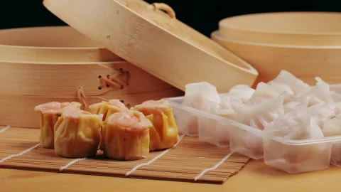 Various of frozen dim sum close-up macro. Food to take away. Chinese dessert Stock Footage 260361306