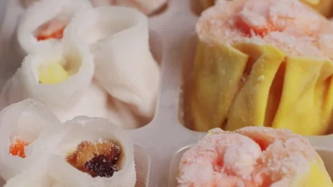 Various of frozen dim sum close-up macro. Food to take away. Chinese dessert Stock Footage 266959367