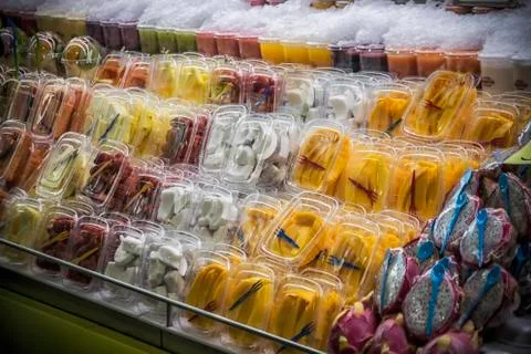 Various Fruit in Plastic Boxes Stock Photos
