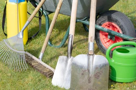 Various garden tools for cleaning a garden Stock Photos