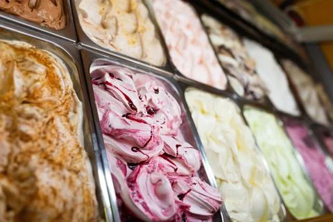 Various Gelato in a store window. Multicolor Ice cream rack in a snack bar Stock Photos
