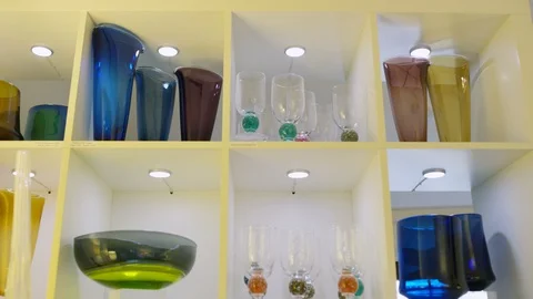 Various glassware kept in display shelf Stock Footage 107925980