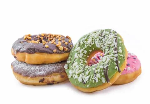 Various glazed donuts isolate on white background. Stock Photos