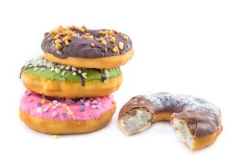 Various glazed donuts isolate on white background. Stock Photos
