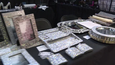 Various glitter boutiques arranged on table at RuPaul's DragCon event Stock-Footage 84507738