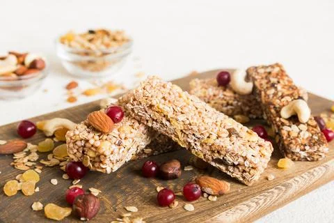 Various granola bars on table background. Cereal granola bars. Superfood br.. Stock Photos