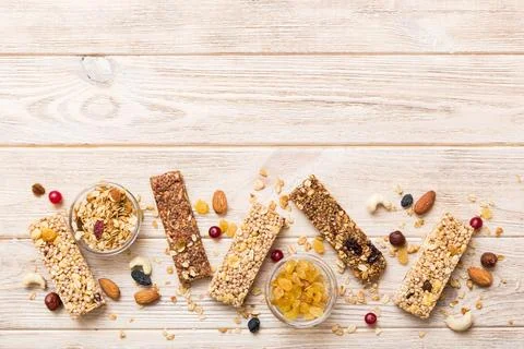 Various granola bars on table background. Cereal granola bars. Superfood br.. Stock Photos