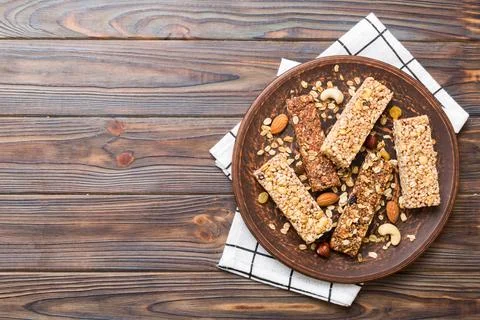 Various granola bars on table background. Cereal granola bars. Superfood br.. Stock Photos