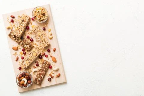 Various granola bars on table background. Cereal granola bars. Superfood brea Stock Photos