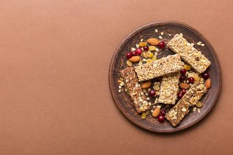 Various granola bars on table background. Cereal granola bars. Superfood br.. Stock Photos