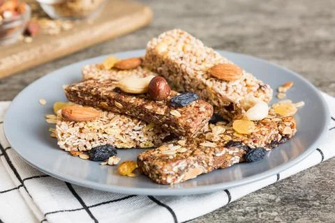 Various granola bars on table background. Cereal granola bars. Superfood br.. Stock Photos