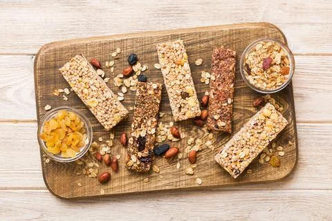 Various granola bars on table background. Cereal granola bars. Superfood br.. Stock Photos