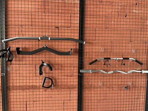 Various gym cable machine attachments Stock Photos